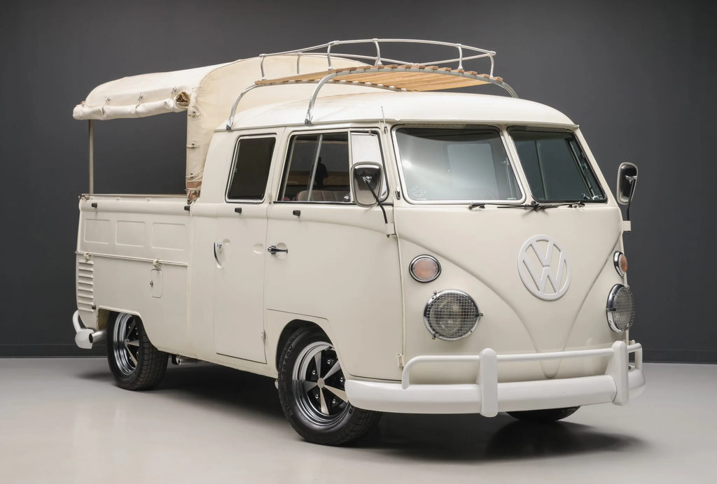 AI caption: a white volkswagen bus with a roof top, vintage