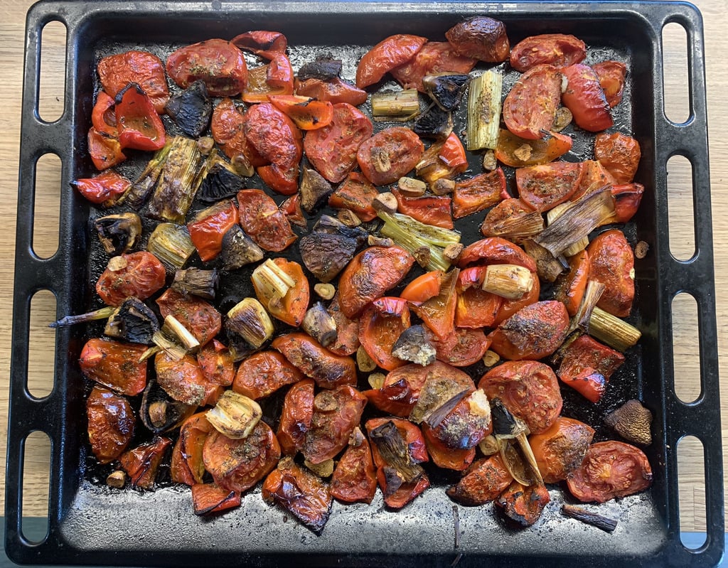 AI caption: a tray of roasted vegetables, black and white