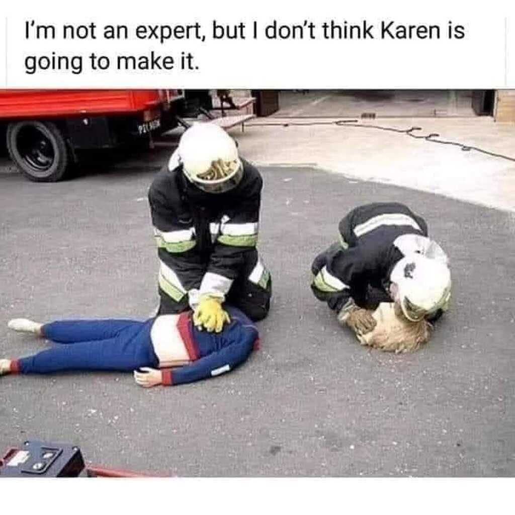 AI caption: a firefighter is laying on the ground with a mannequin, comic