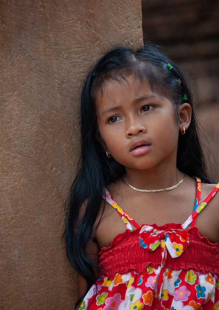 AI caption: the girl is smiling, the girl is wearing a dress that is too short, portrait