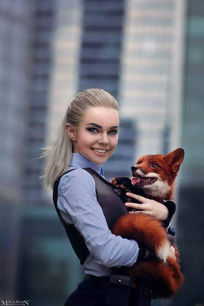 AI caption: a woman holding a fox in front of a city, portrait