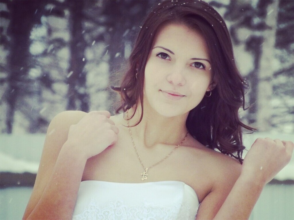 AI caption: a woman in a red skirt and black jacket, portrait a beautiful woman in a white dress posing in the snow